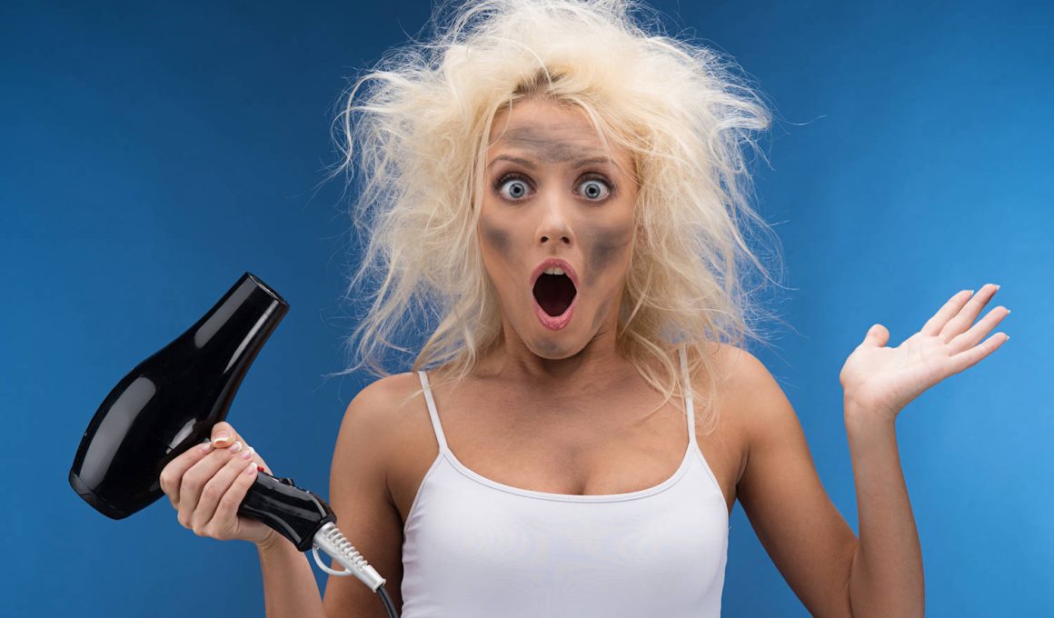 Young blonde woman with shocked hair